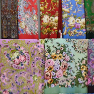Colorful floral patterned textiles displayed textiles