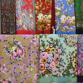 Colorful floral patterned textiles displayed textiles