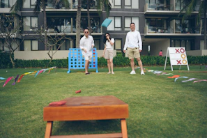 People playing outdoor games on a sunny day