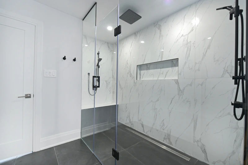 Non Slip Shower Mat in Compton — Glass-enclosed shower with marble walls