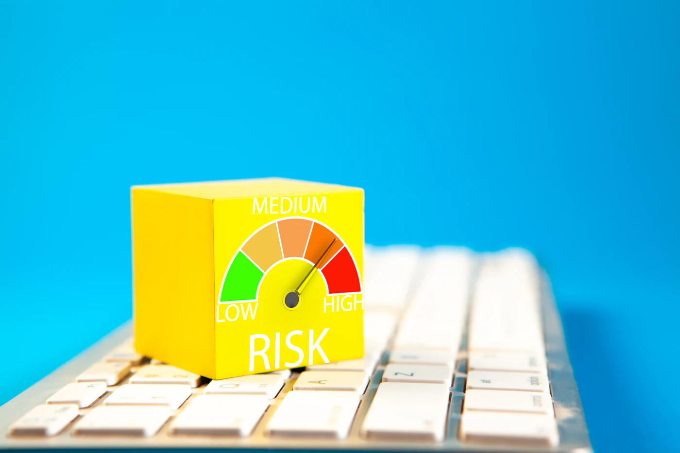 Modern financial risk meter on computer keyboard representing commercial bank risk management