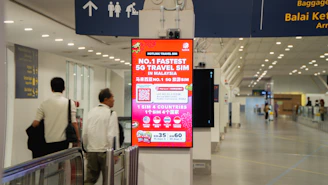 Digital advertisement for travel sim card in airport.
