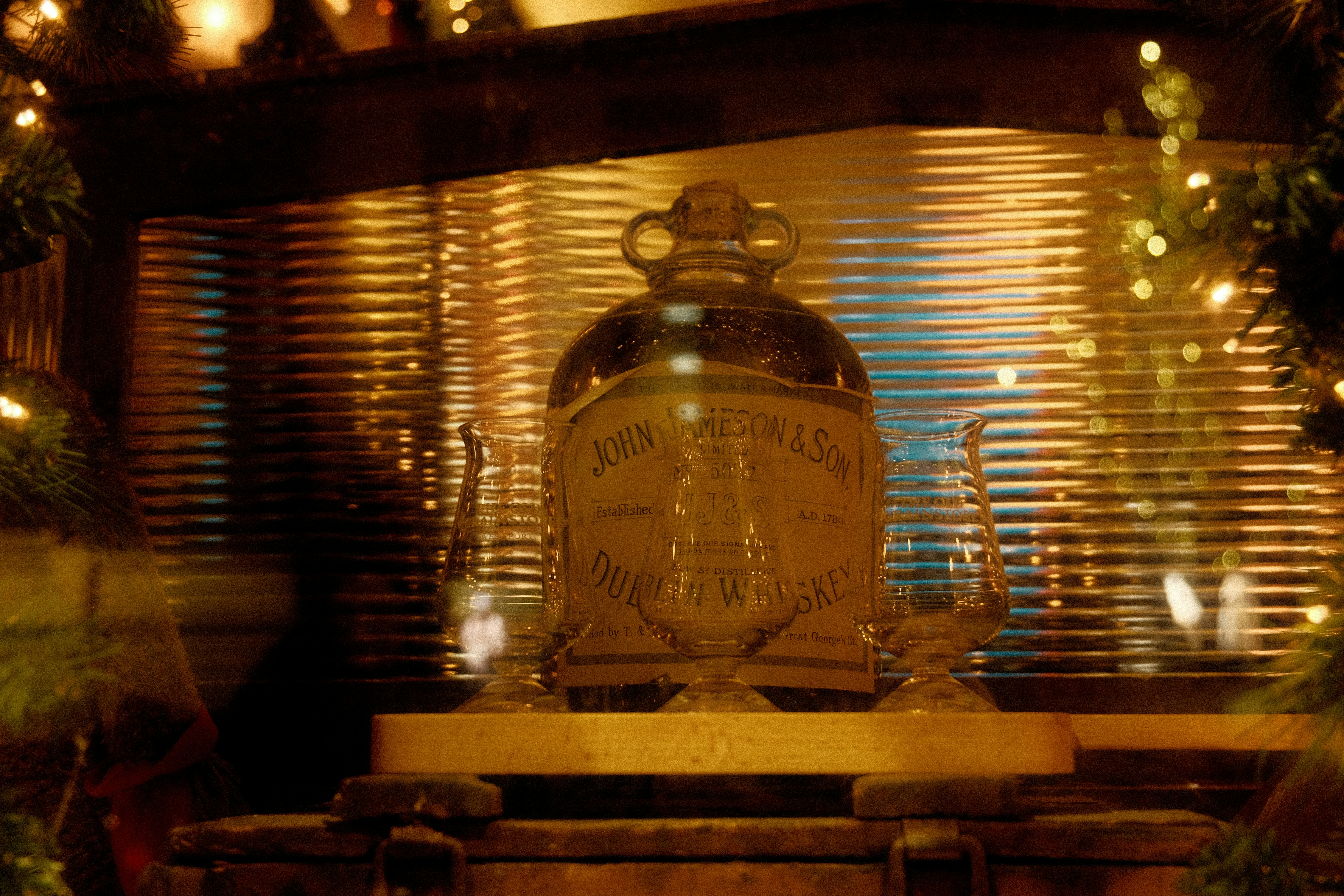 Antique glass bottle with decorative accents and lights