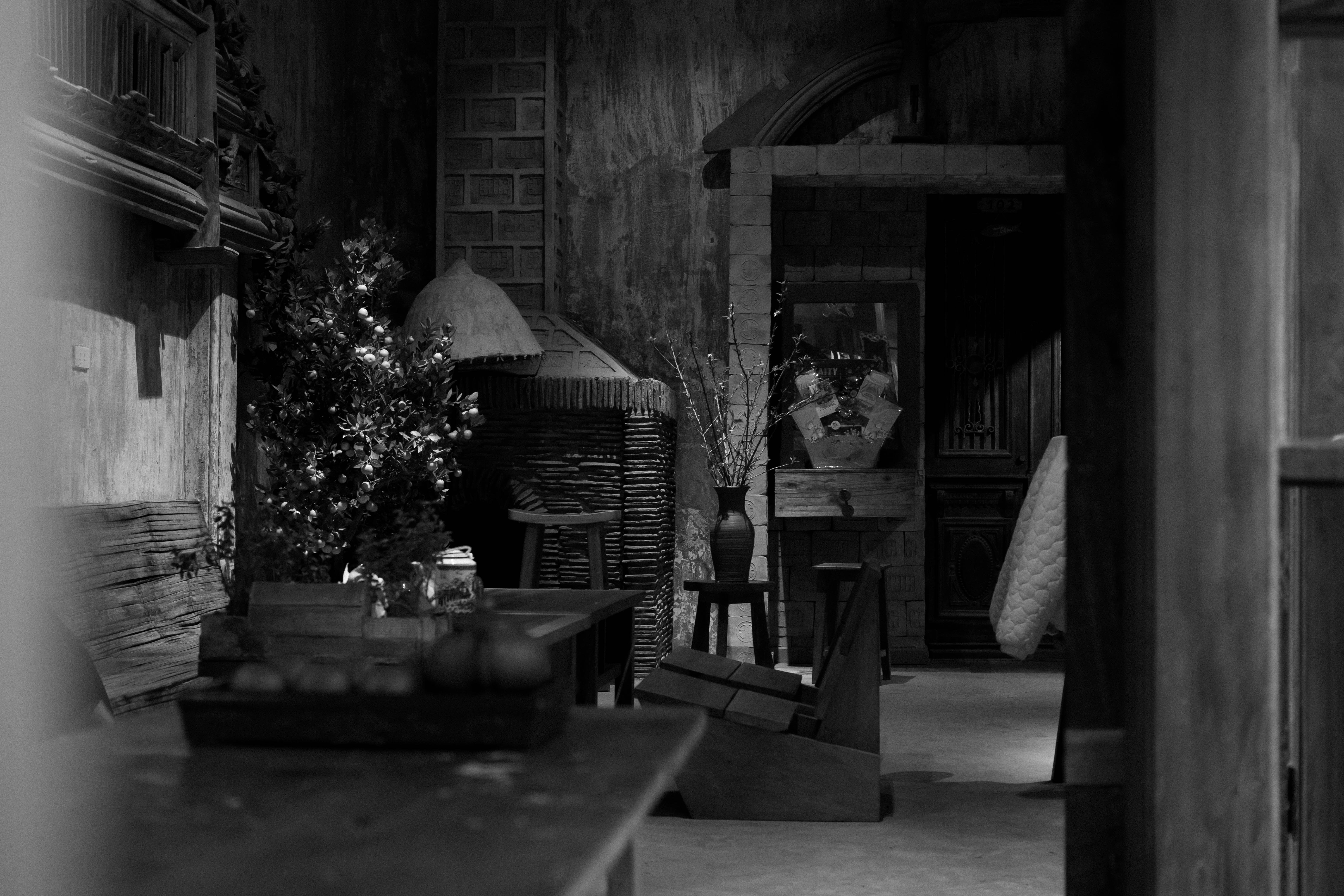 A dimly lit, rustic room with traditional decor.