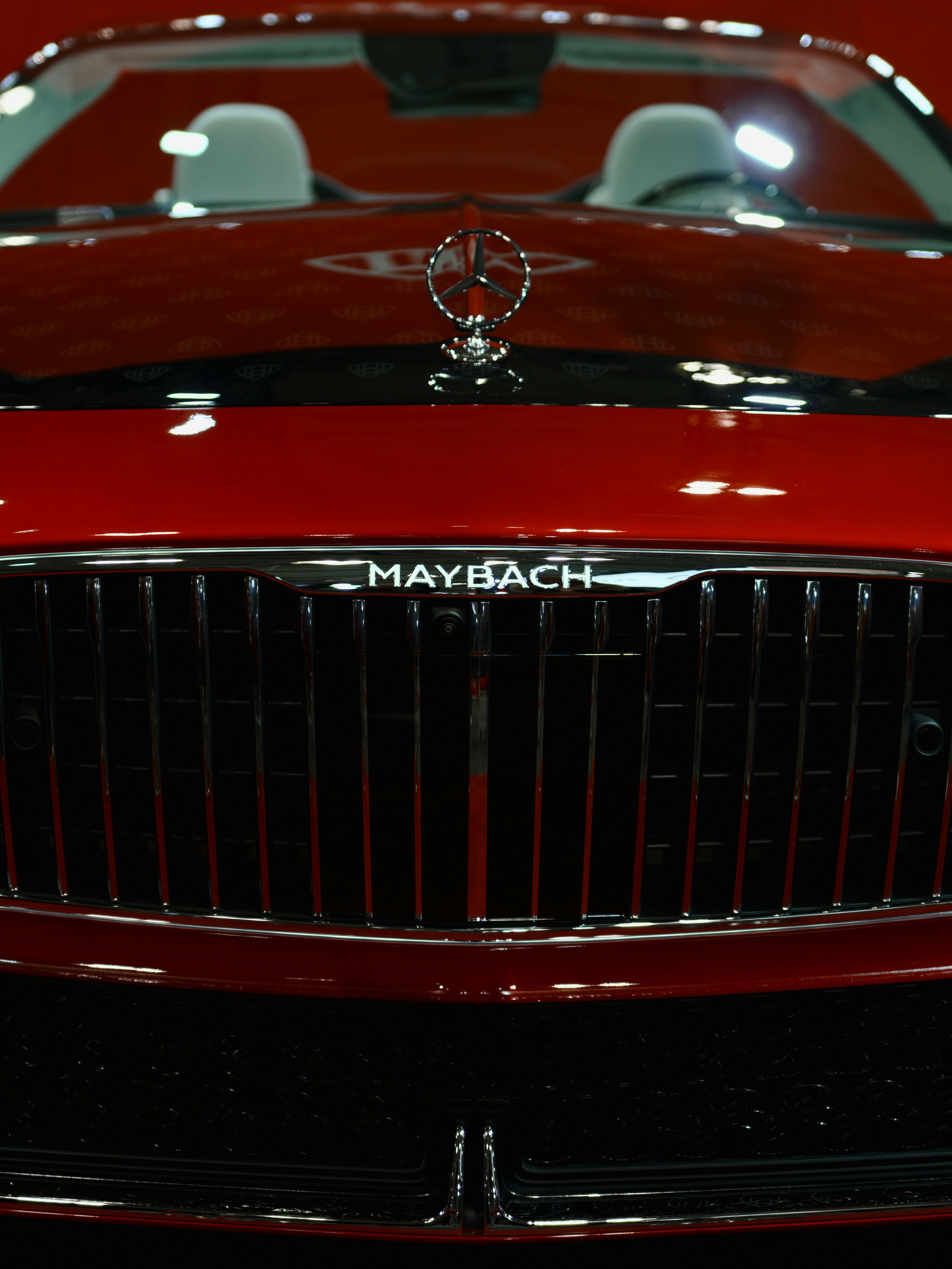 Close-up of a red maybach car grille and grille