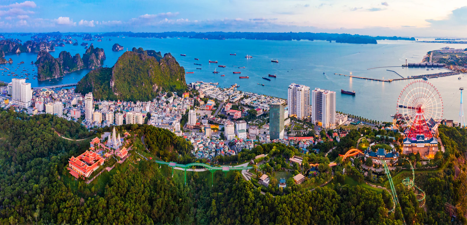 Panoramic view of Ha Long coastal city, islands and boats in Vietnam
