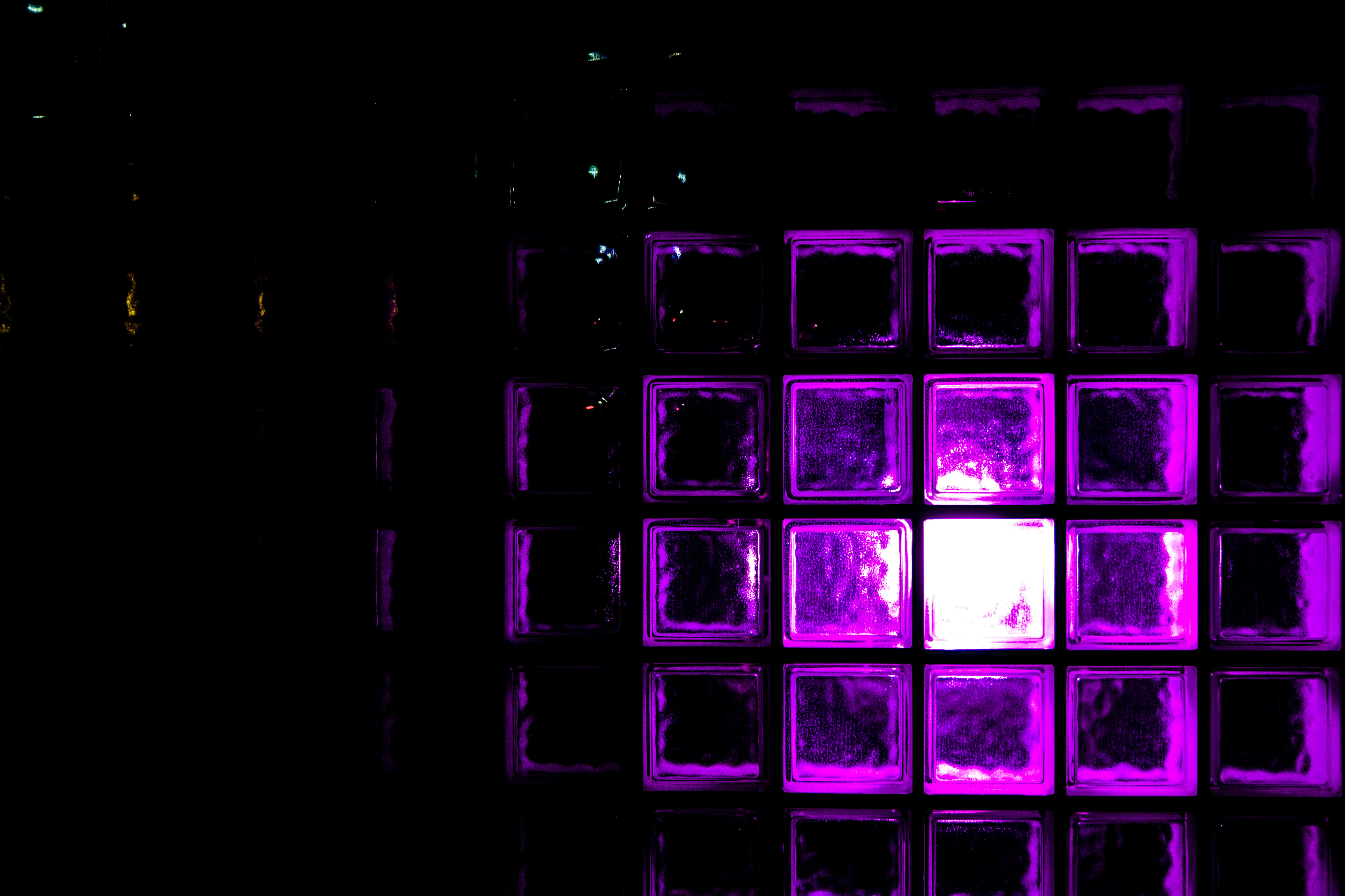 Purple glass blocks illuminated from within.