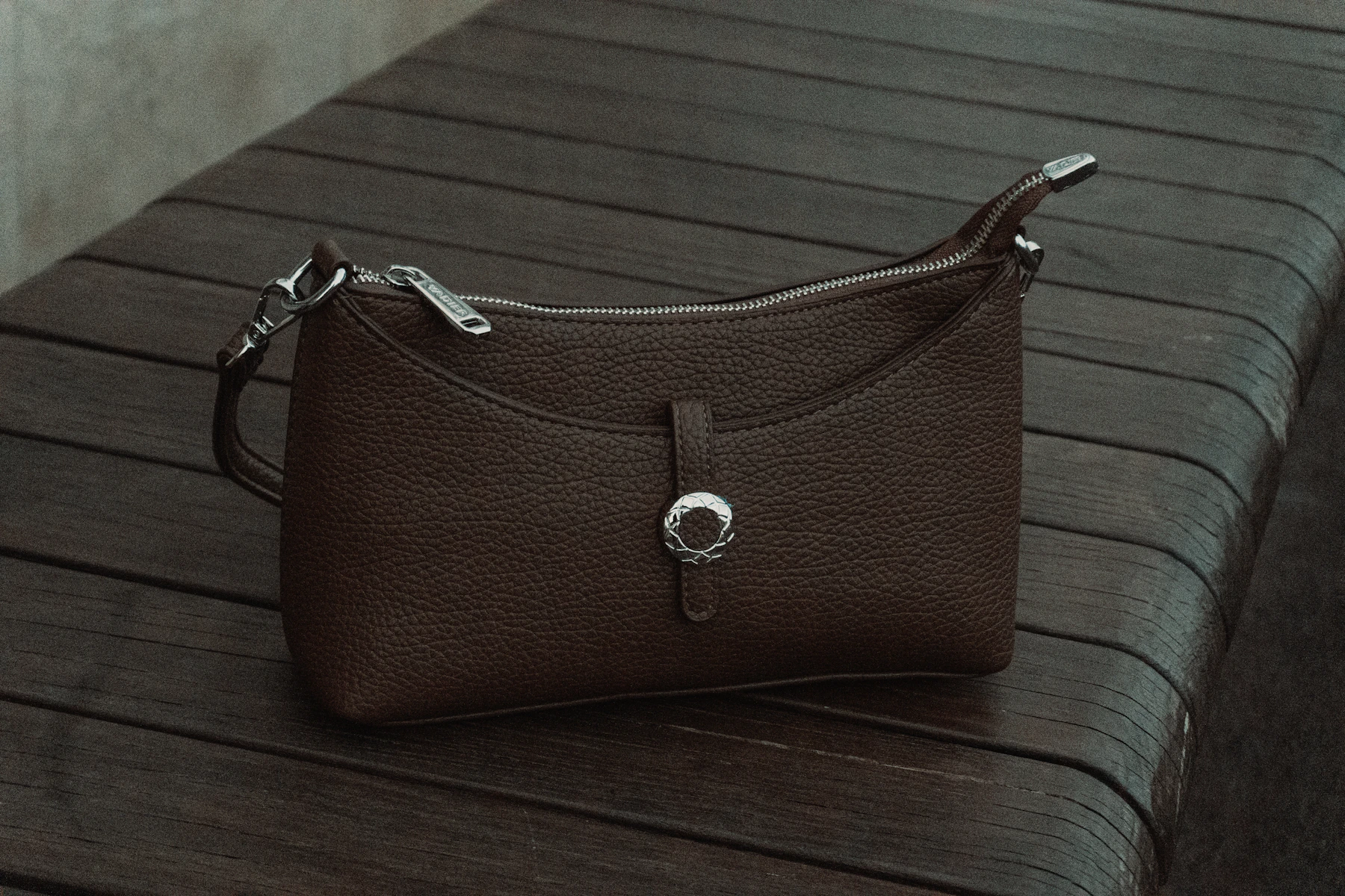 Finished brown leather handbag