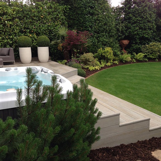 Private hot tub on an enclosed terrace at a Cornish cottage near Looe