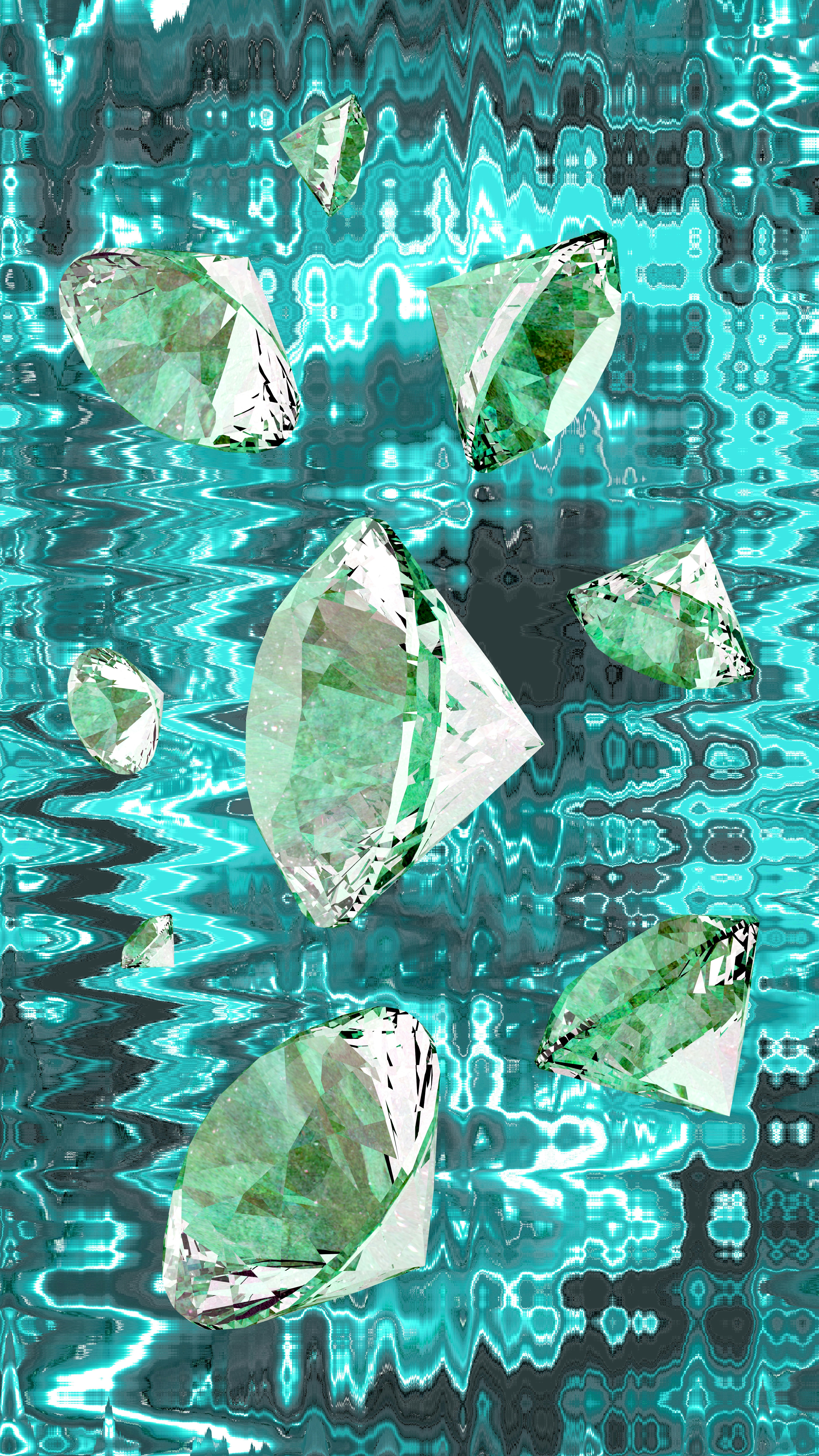 Several clear diamonds float on a turquoise wavy background