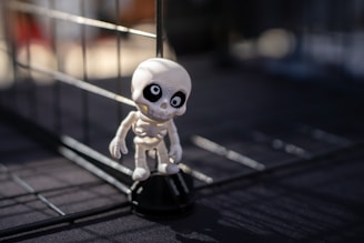 A small skeleton toy with big eyes