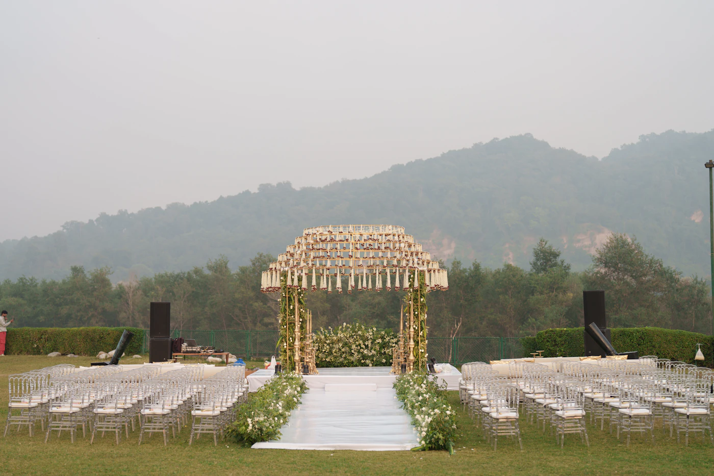 Wedding ceremony programs for interfaith unions — A printed wedding ceremony program resting on a chair.