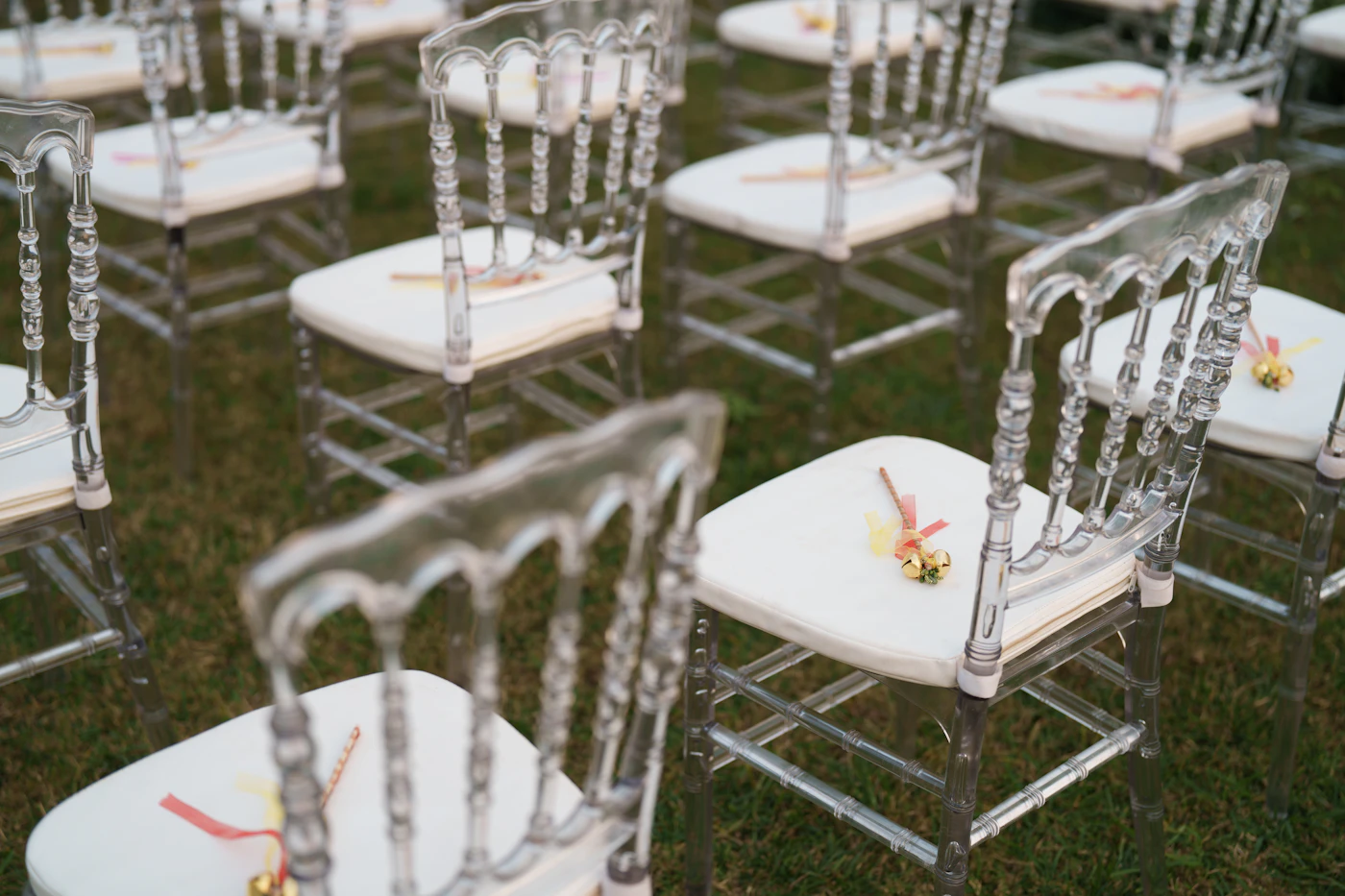 How to incorporate deceased family members into ceremonies — A memorial table with framed photos and candles at a wedding reception.