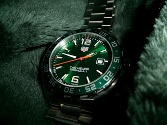 Green faced tag heuer formula 1 watch
