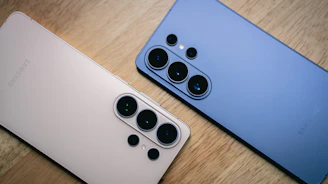Two smartphones with multiple cameras side by side