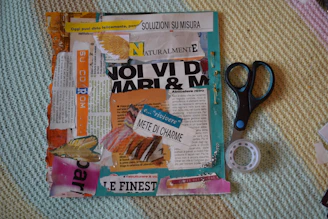 Collage of magazine clippings with scissors and tape.