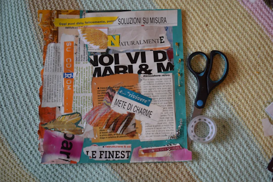 Collage of magazine clippings with scissors and tape.