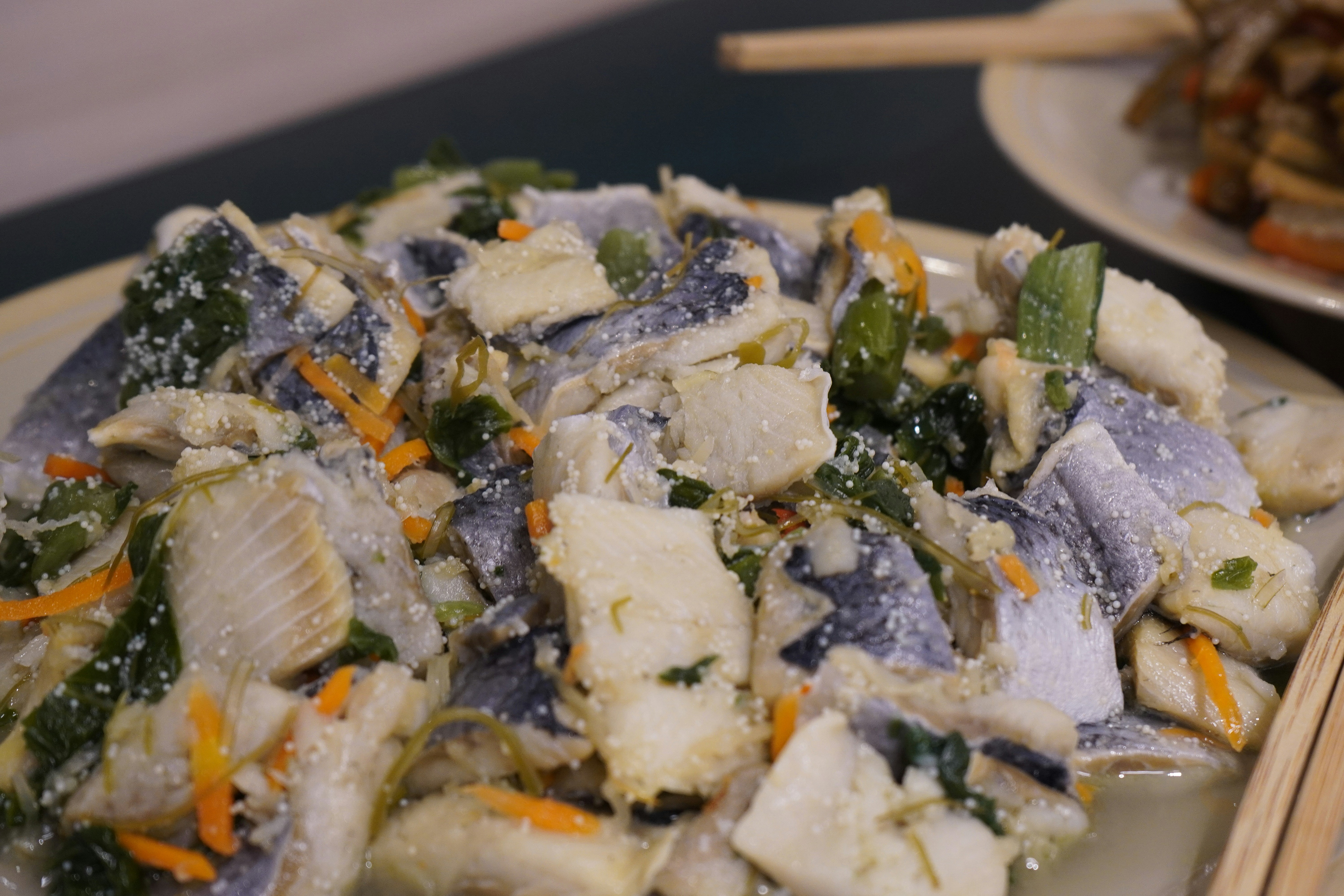 Japanese meal with fish and vegetables