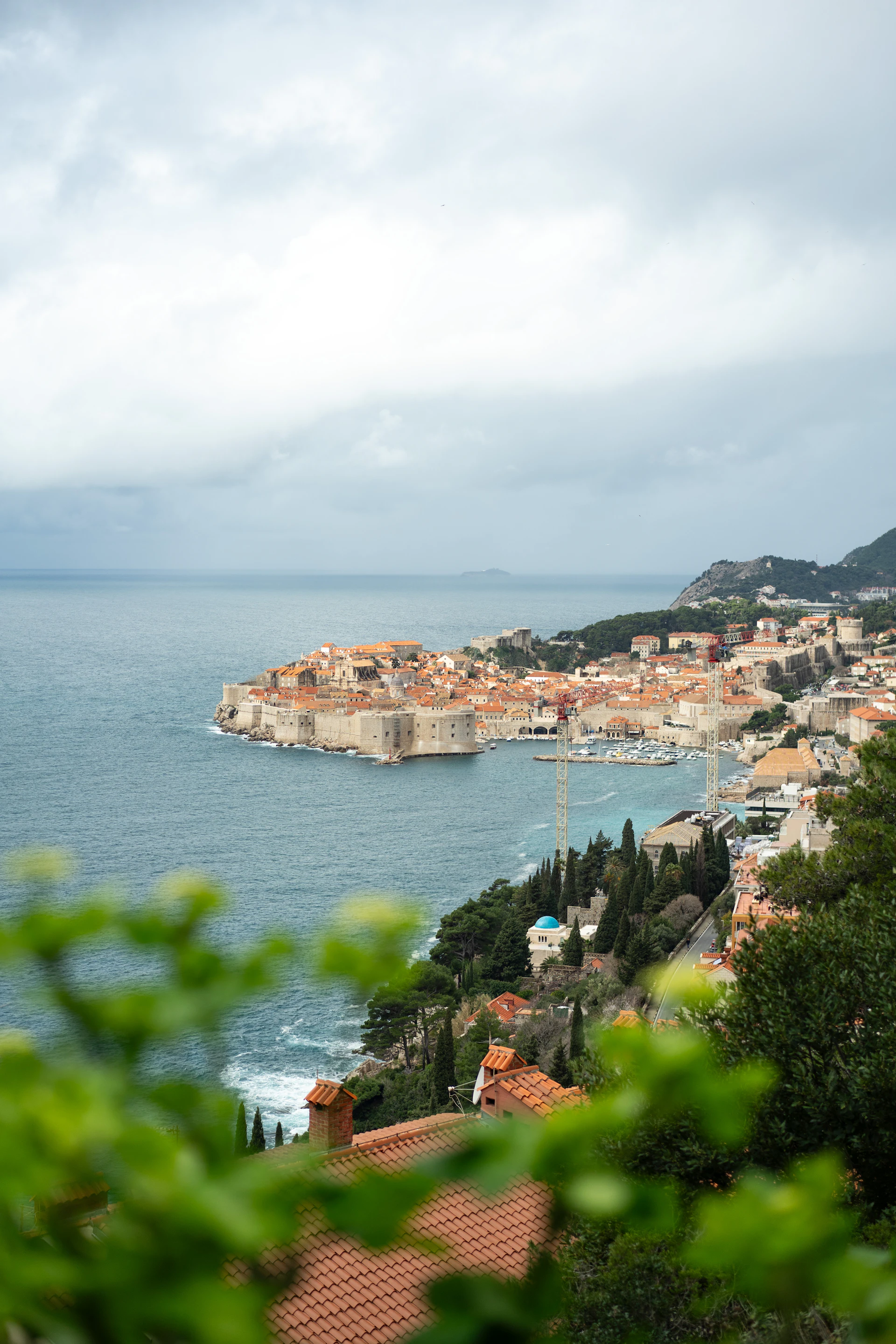 Dubrovnik’s stone city walls and terracotta rooftops beside the Adriatic Sea