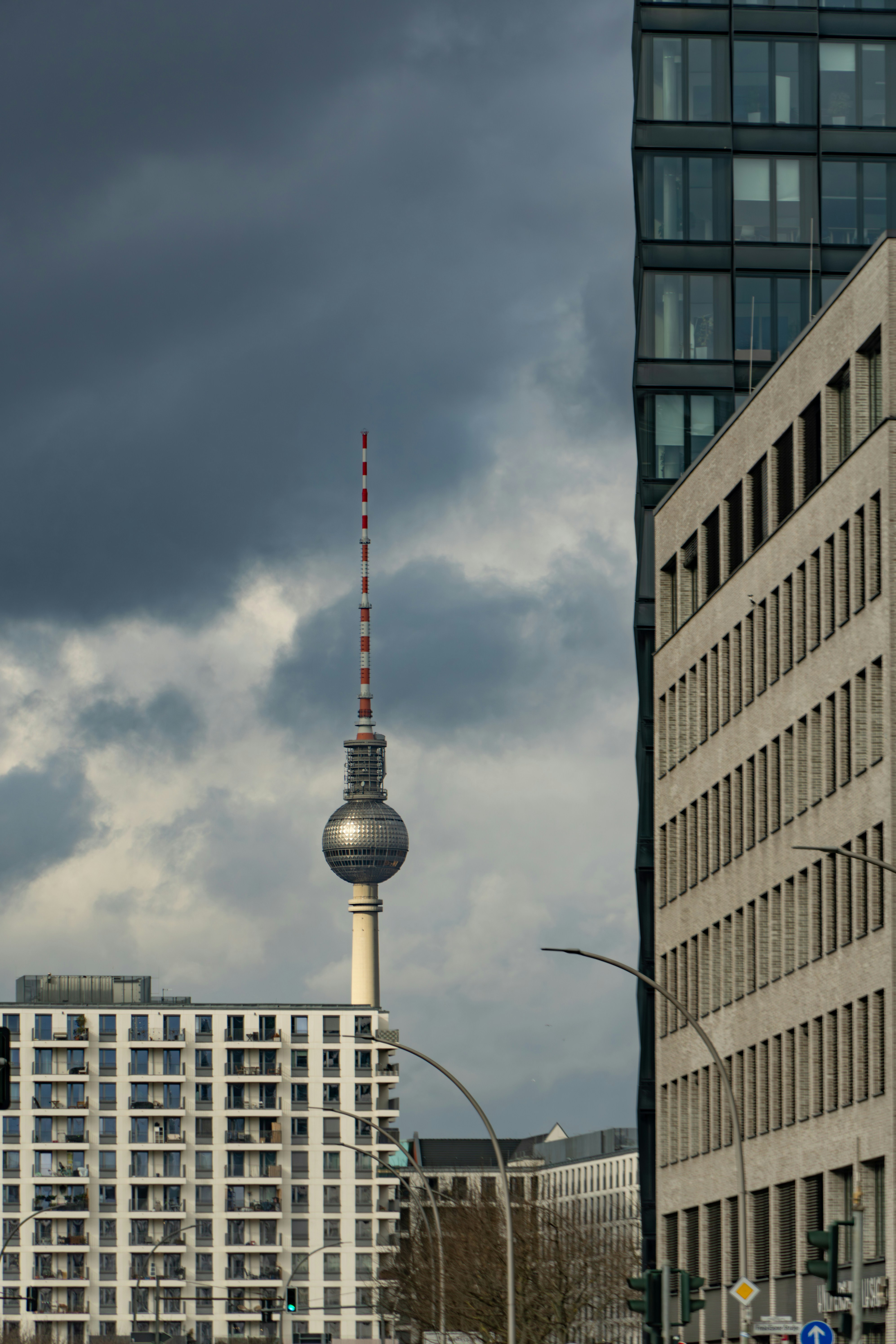 Berlin TV tower behind modern buildings