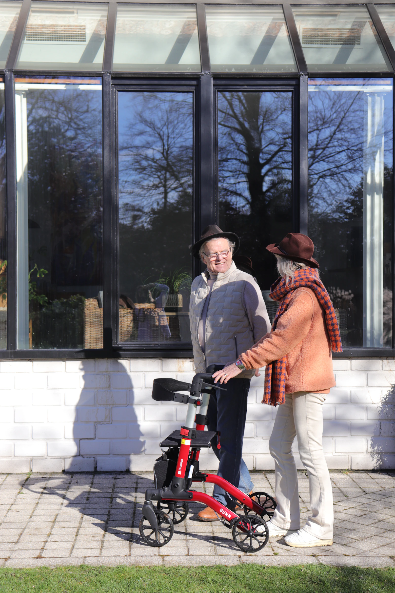 older adults with mobility support illustrating healthcare and aging expenses during retirement
