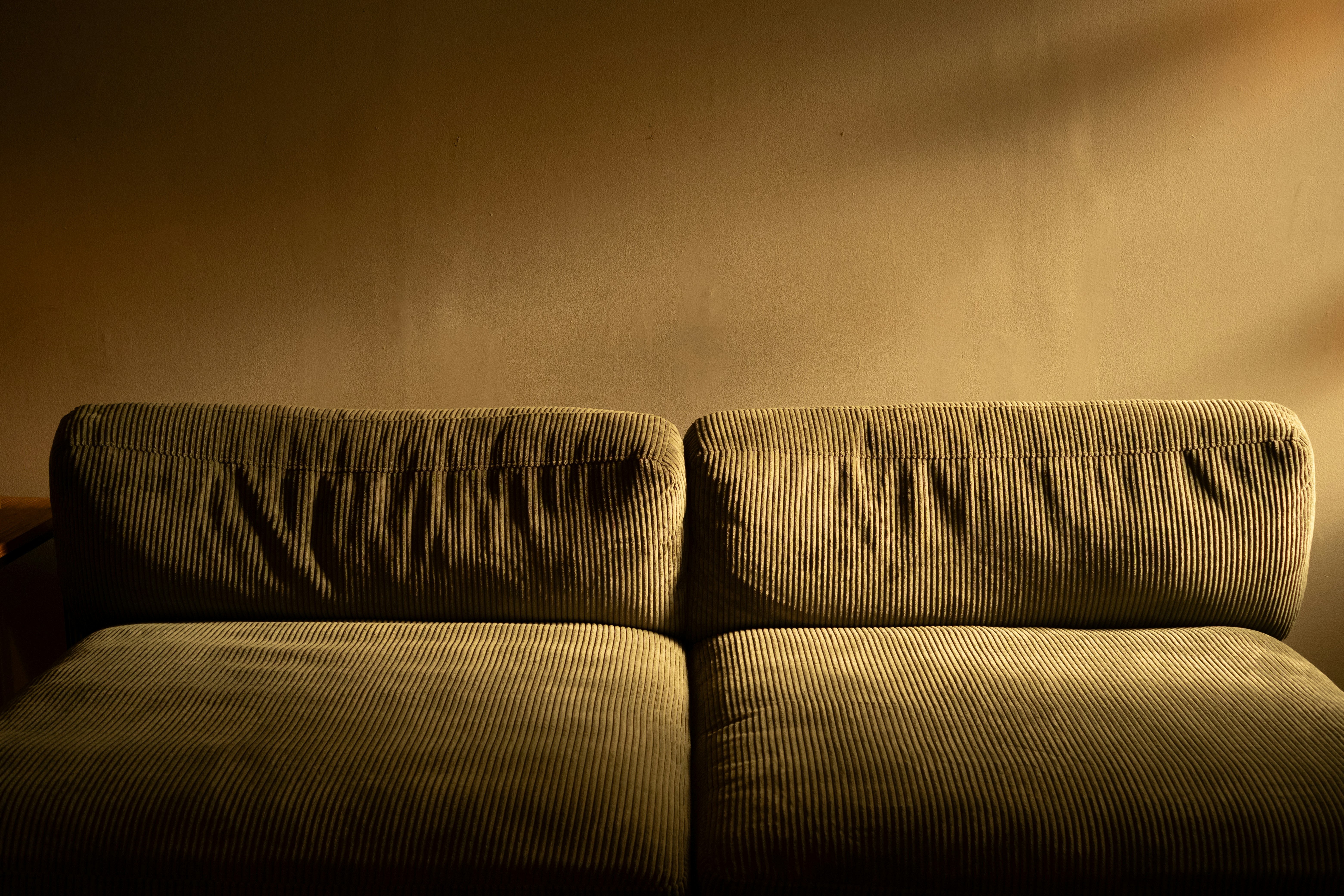 A comfortable sofa in a dimly lit room