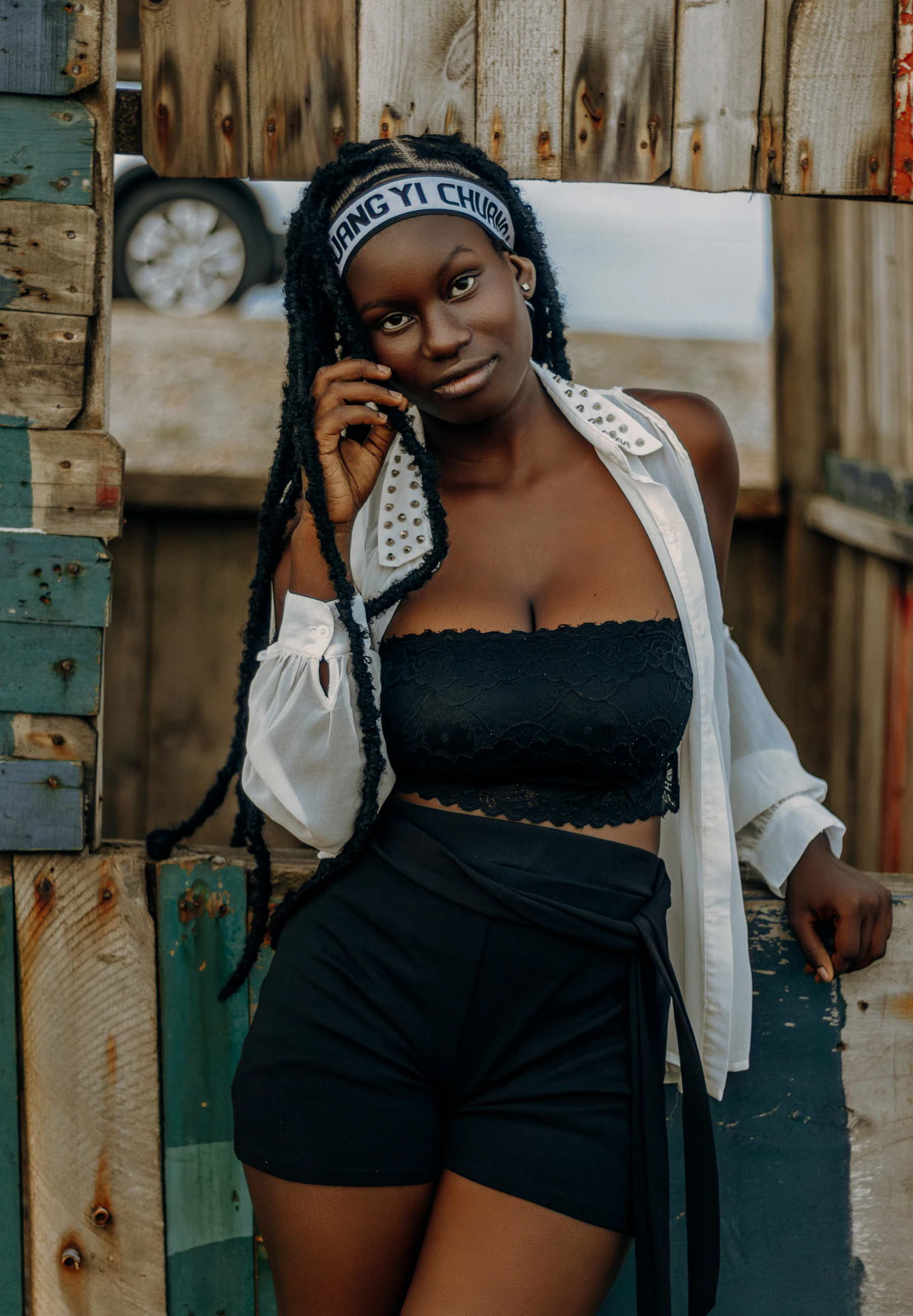 African woman with braids and bandana
