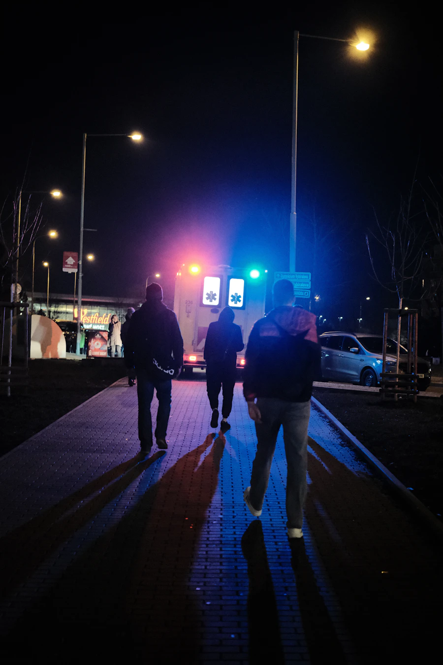 Paramedics providing emergency care inside an ambulance