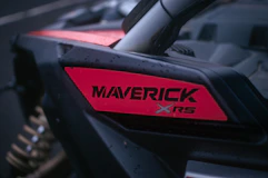 Close-up of a maverick xrs vehicle emblem