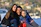 A happy family posing for a photo outdoors