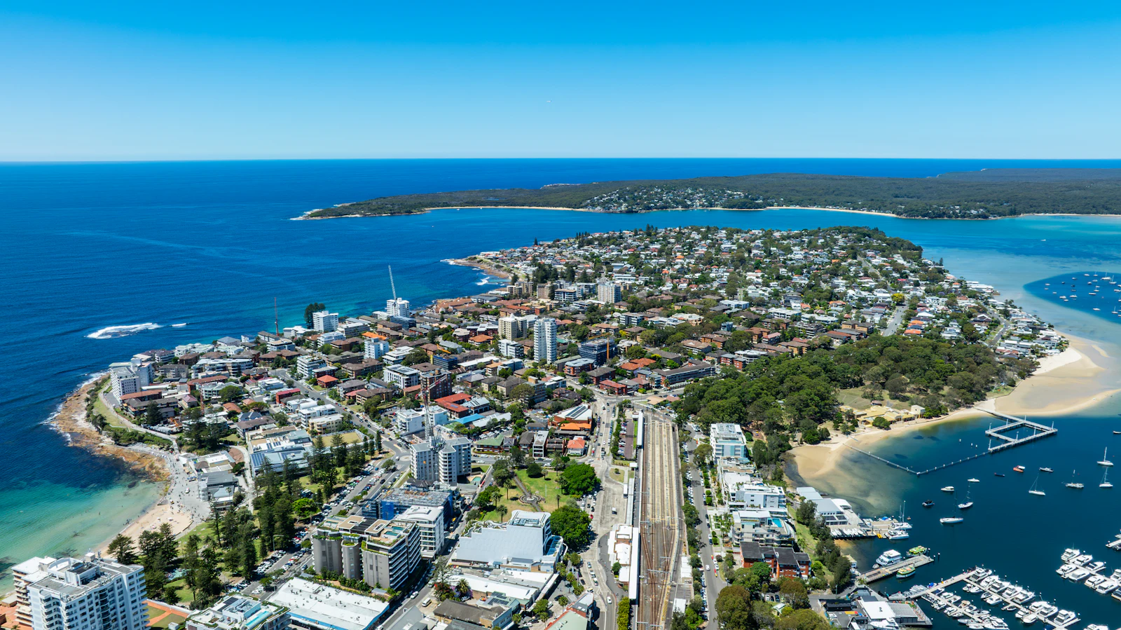 Drone photo of a beachside town with location labels