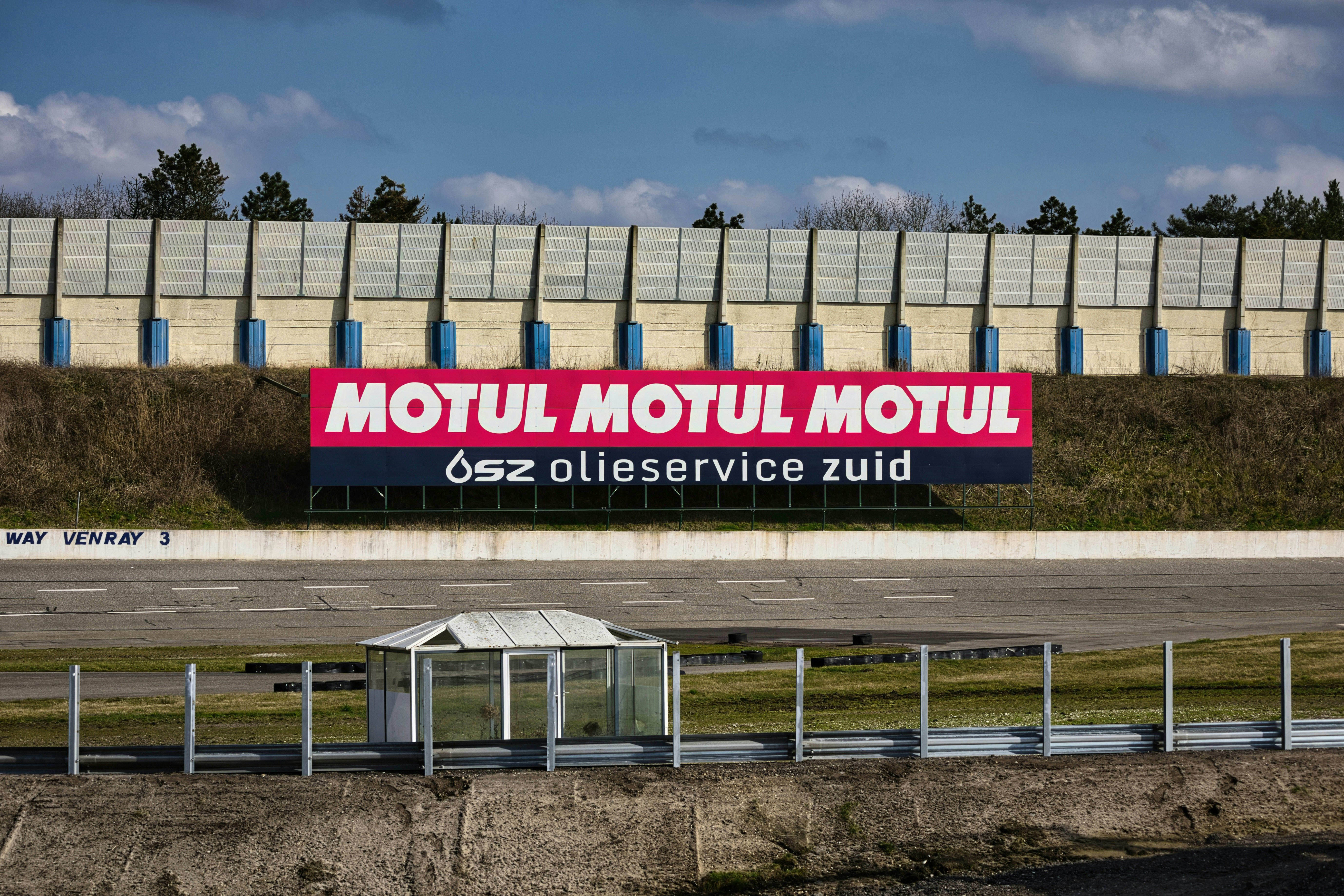 Motul banner on a racetrack grandstand at a race track.