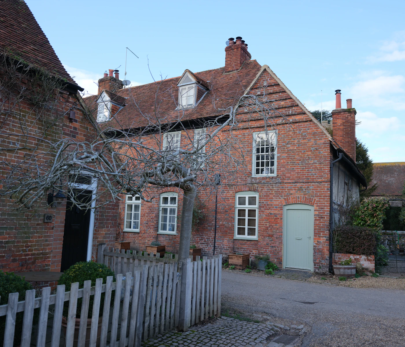 Traditional brick house with dormer windows in Hambleden, Buckinghamshire