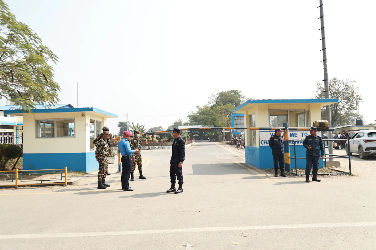 Passengers queuing at an airport security screening checkpoint