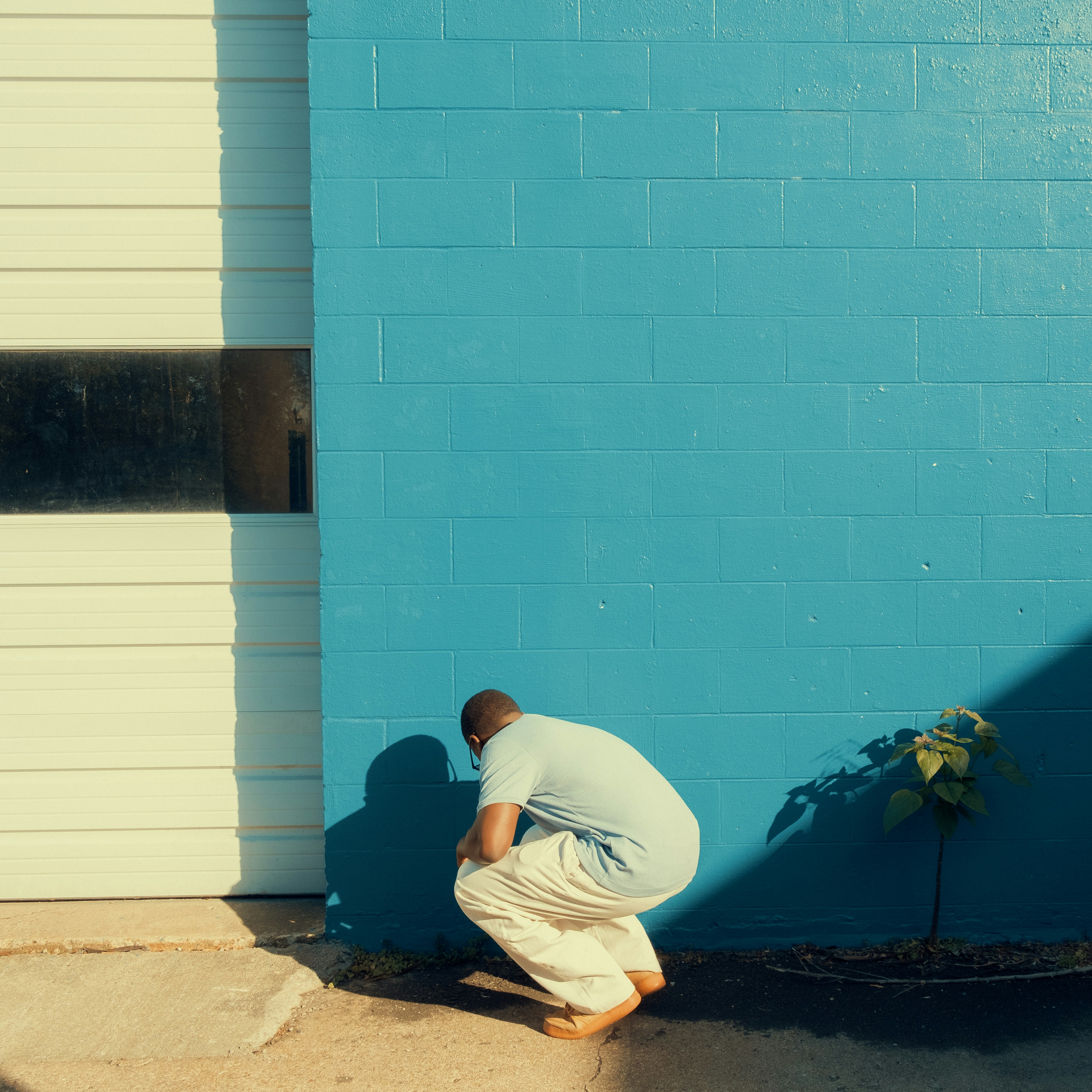 Technician repairing a garage door