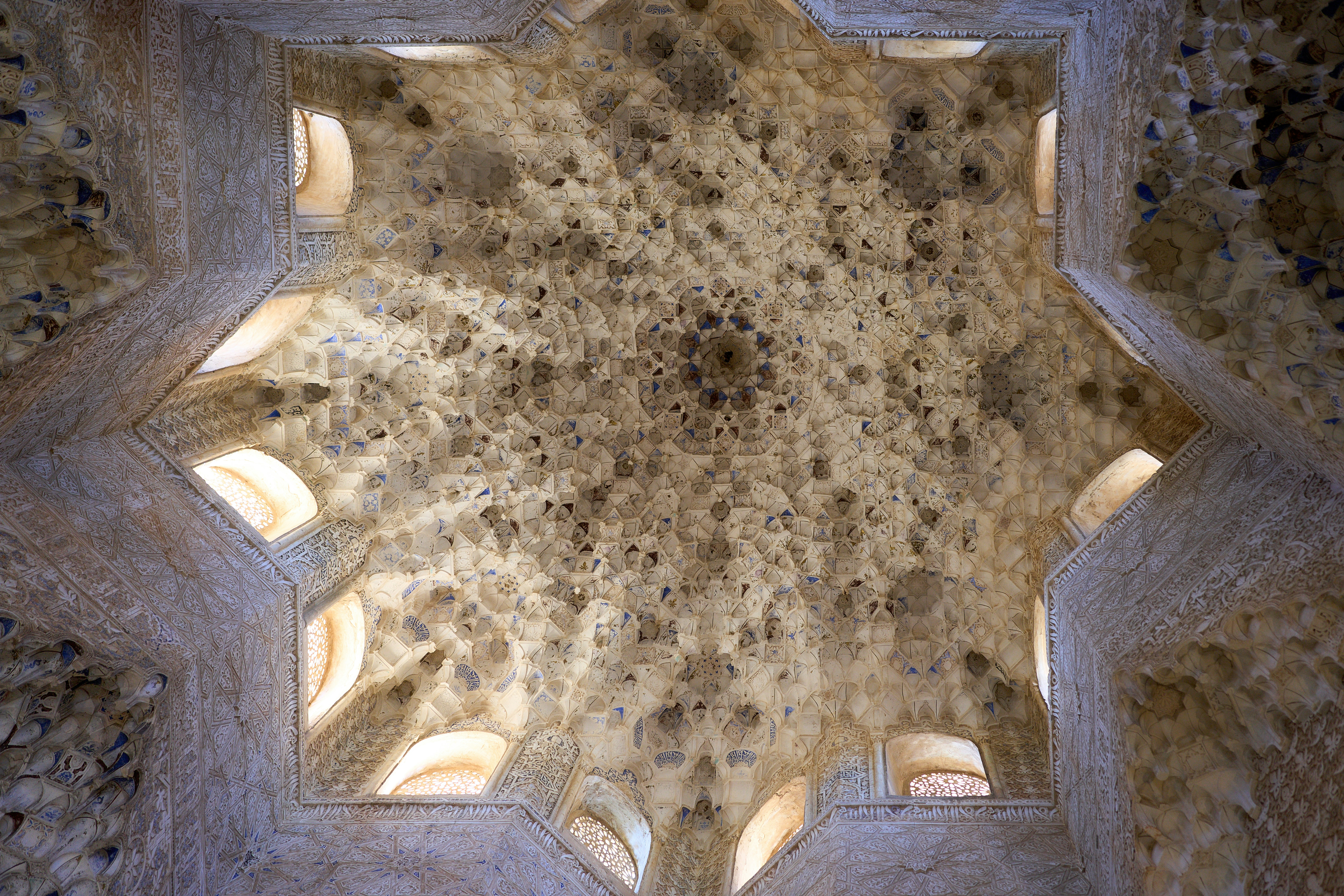 Intricate star-shaped ceiling with detailed patterns.