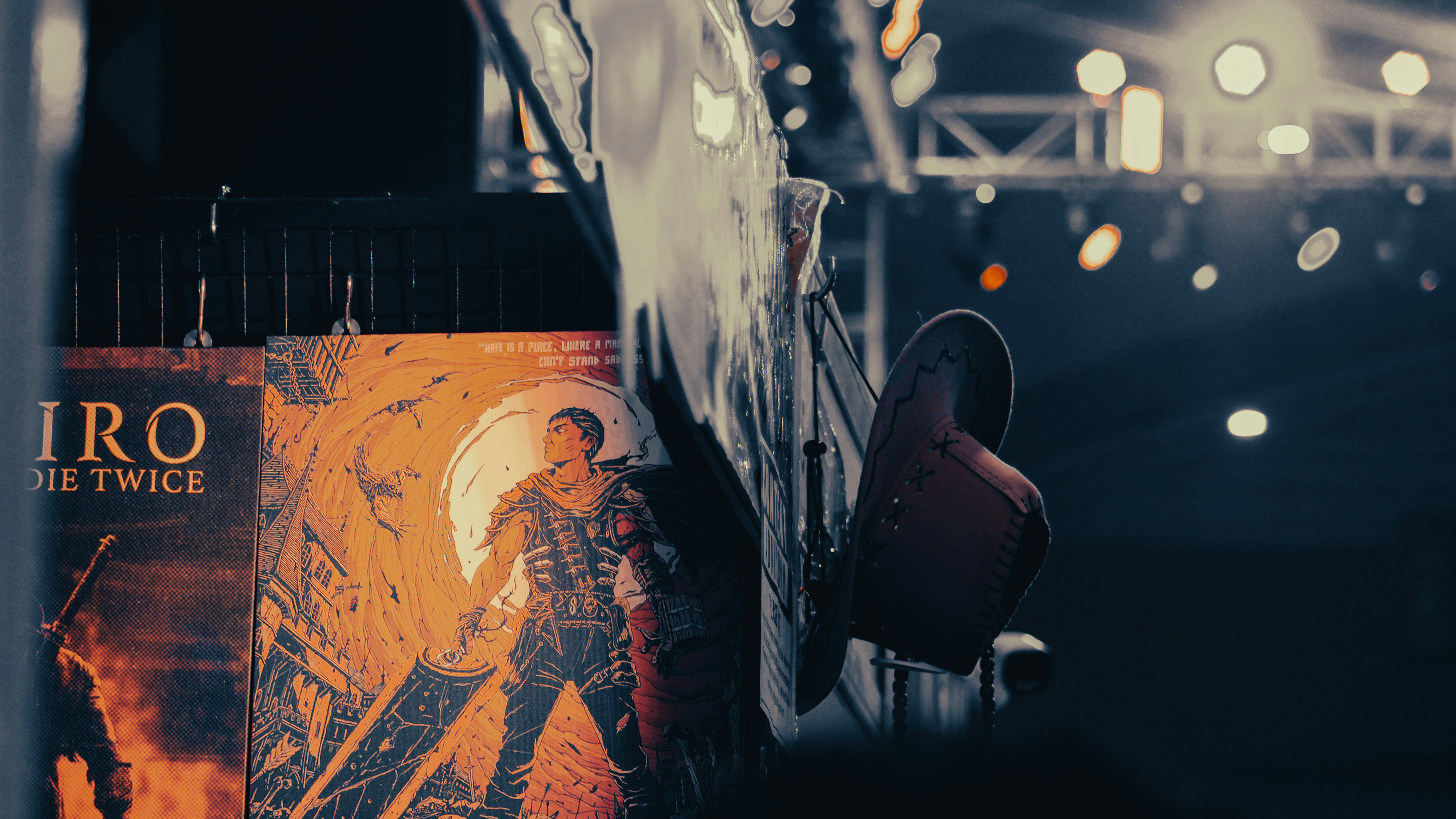 A man with a guitar on a stage.