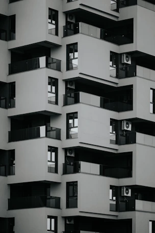 Modern building with geometric balconies and windows