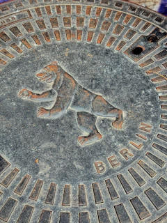 Berlin manhole cover with a bear emblem