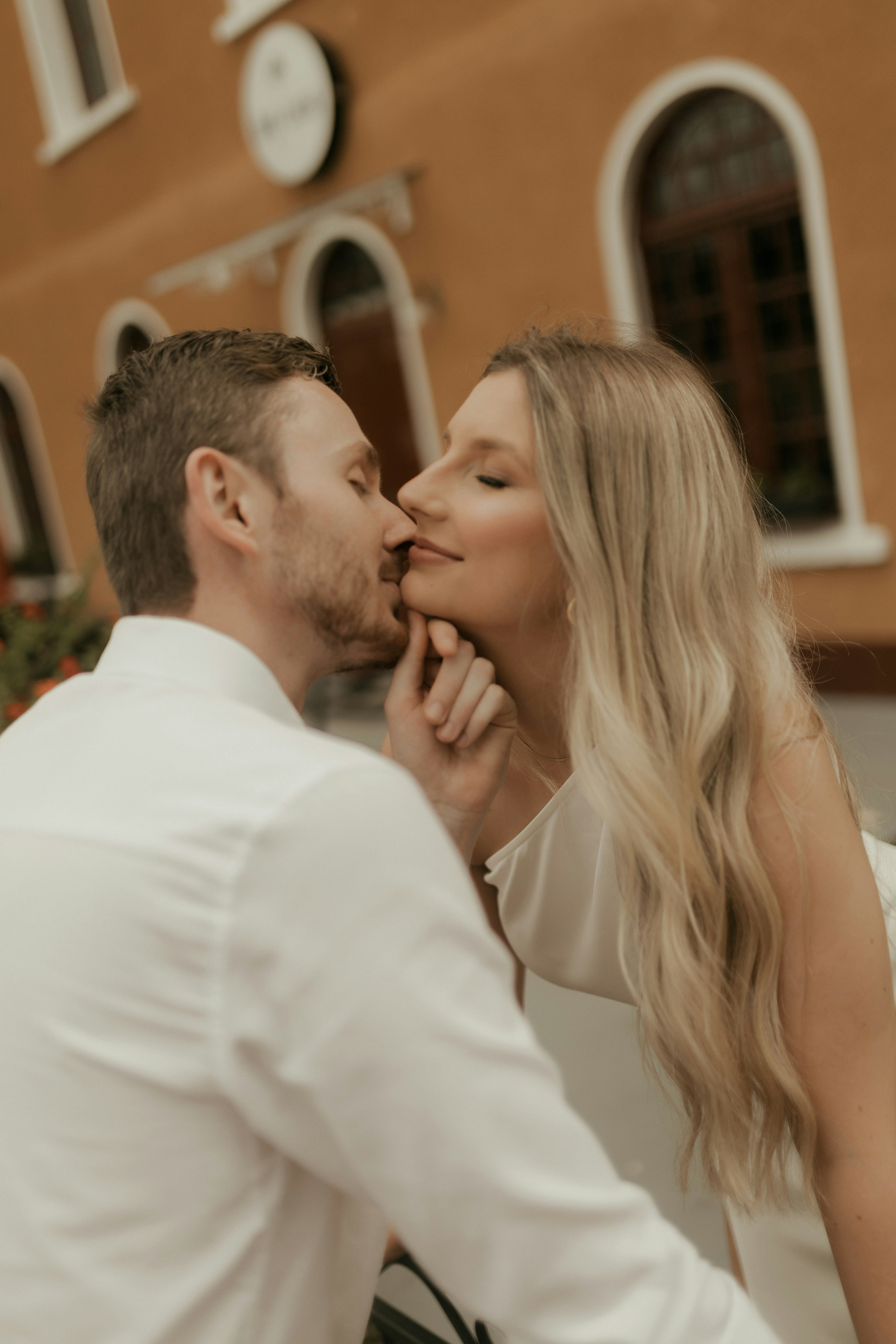 Couple sharing a tender moment outdoors