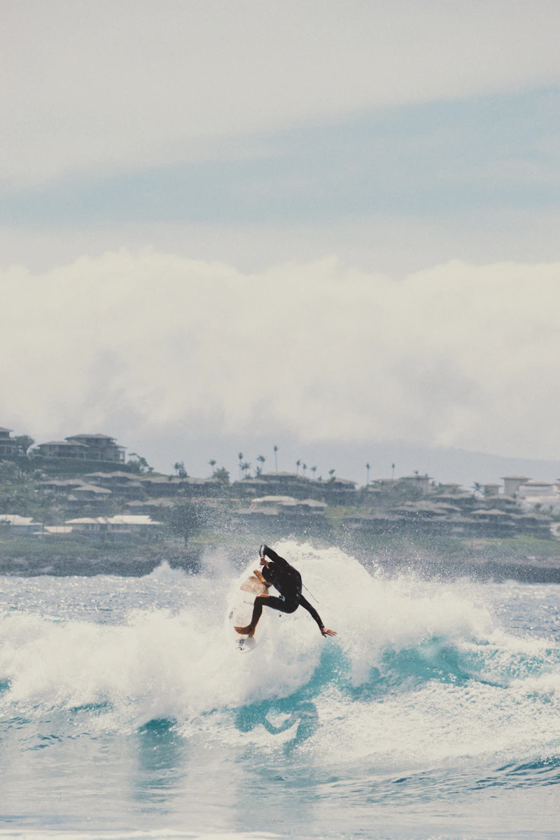 Surfer performing a trick