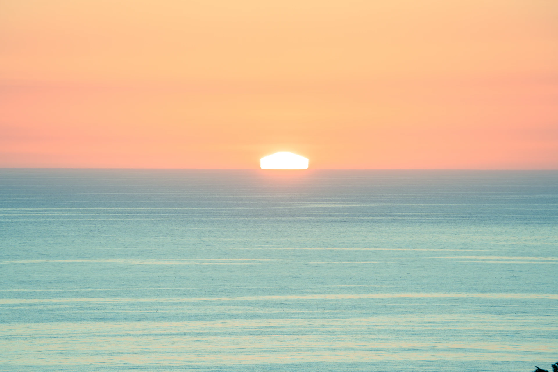 Sunset over a calm ocean
