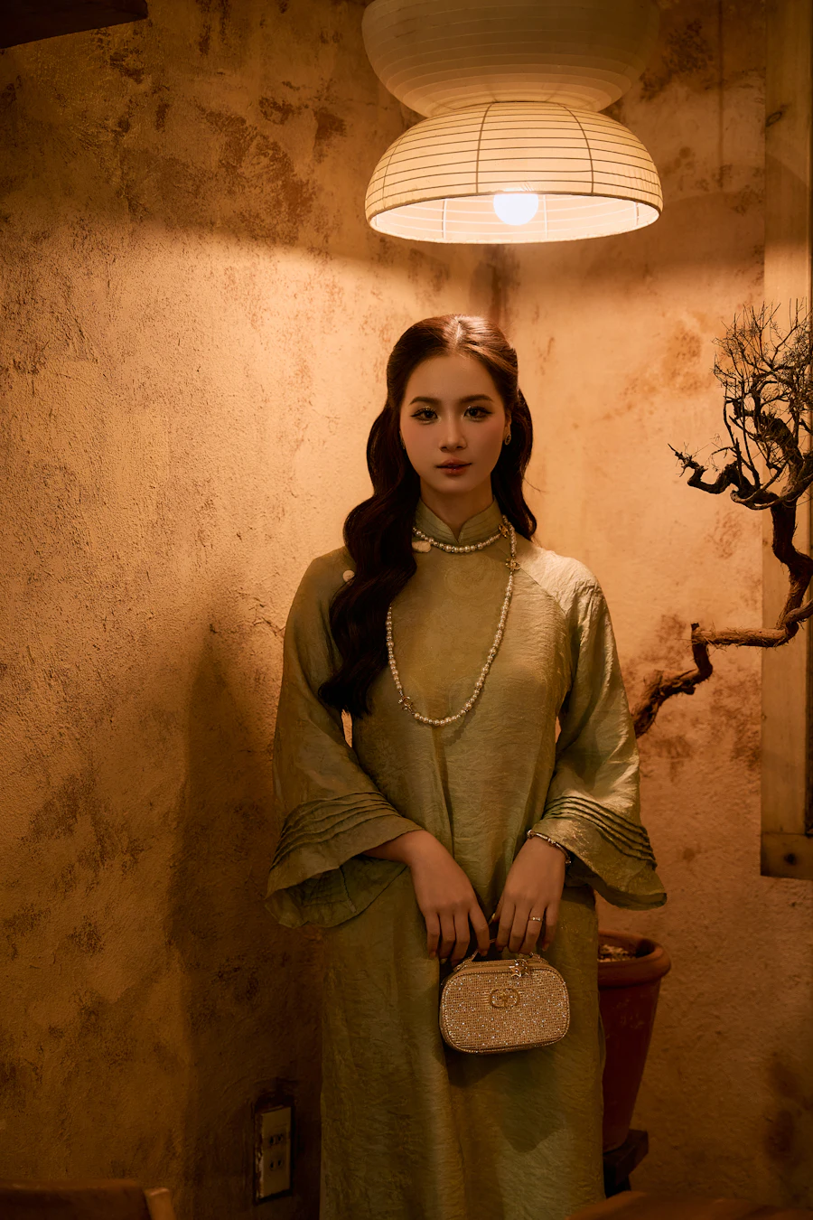 A customer in a vintage dress holding her bag