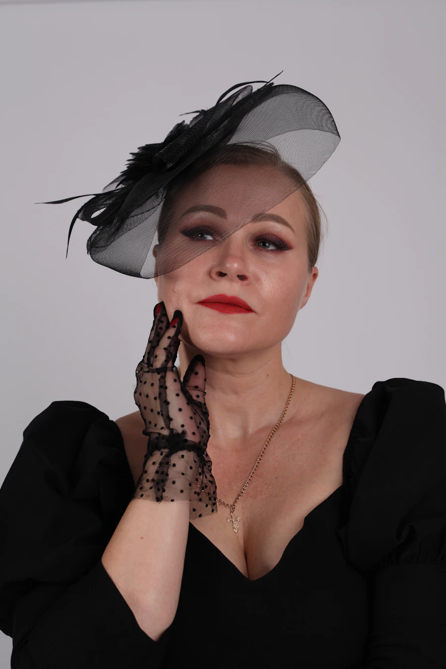 Elegant black fascinator with veil