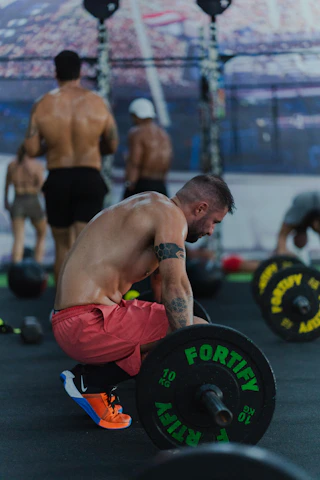 Man lifting weights in a gym