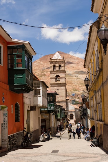 Colonial street in an Andean town, evoking a Spanish-speaking country