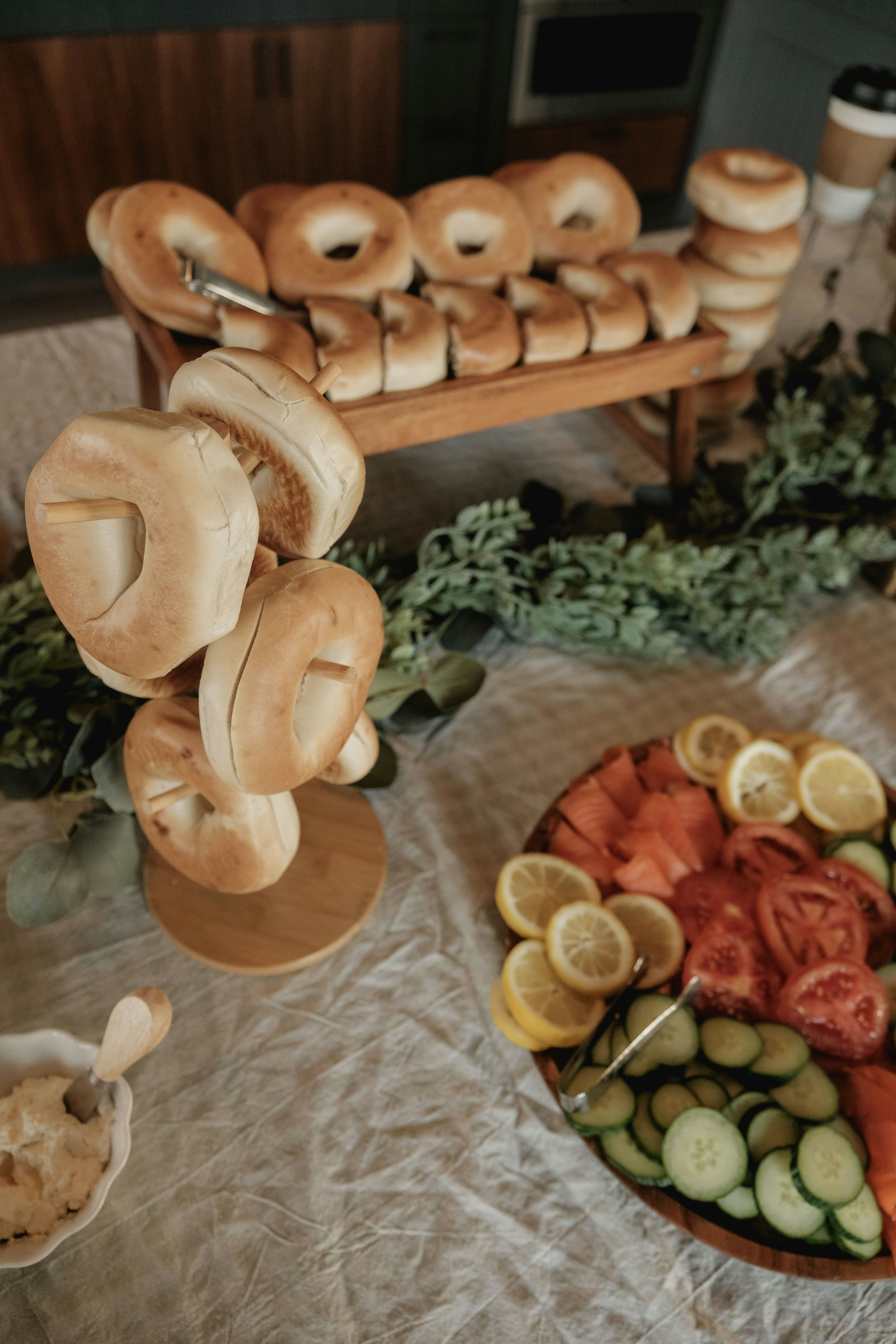 Bagels and toppings arranged on a table