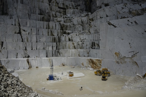 Mining quarry with heavy machinery