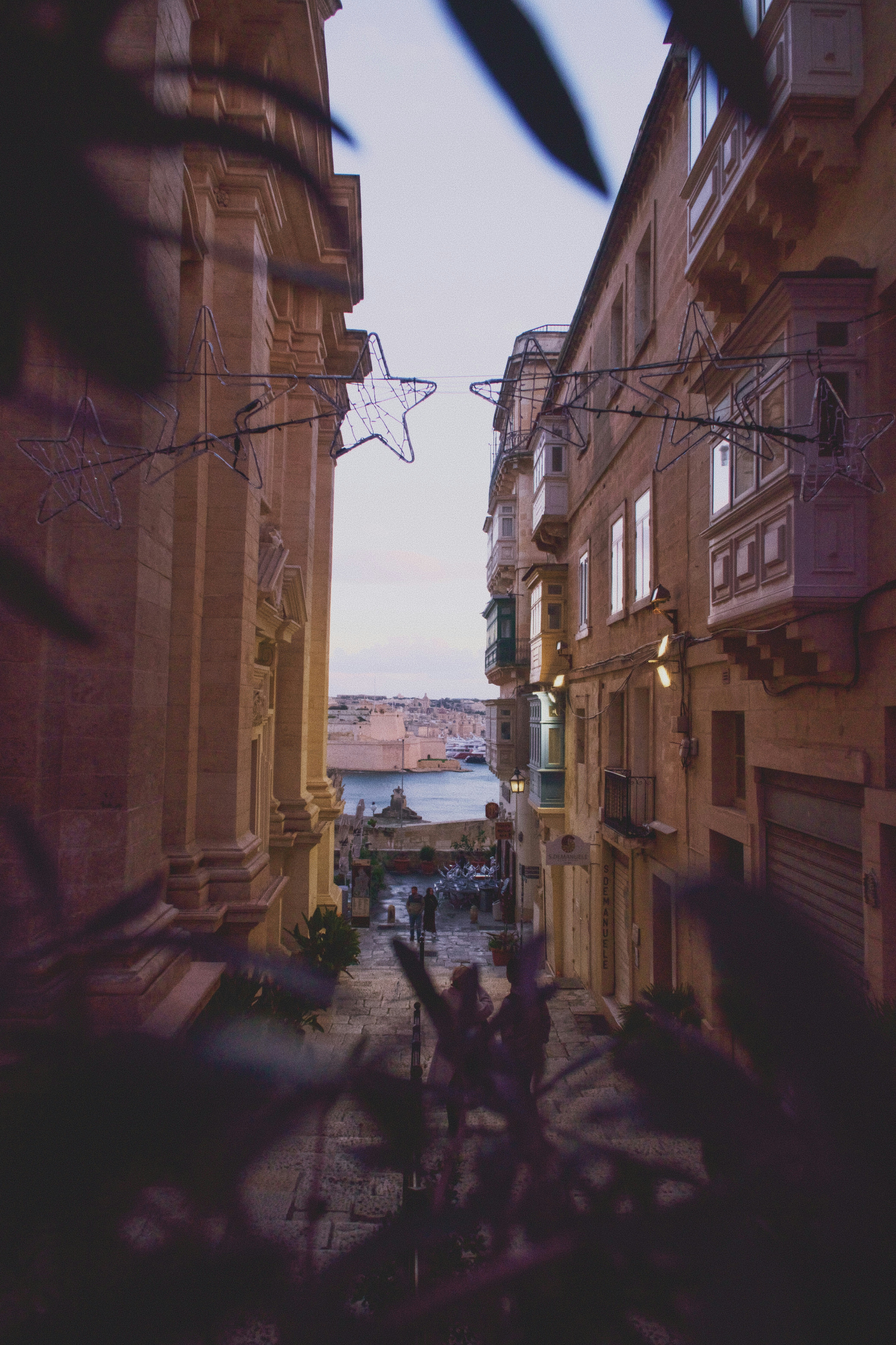 Narrow european street with a view of the sea