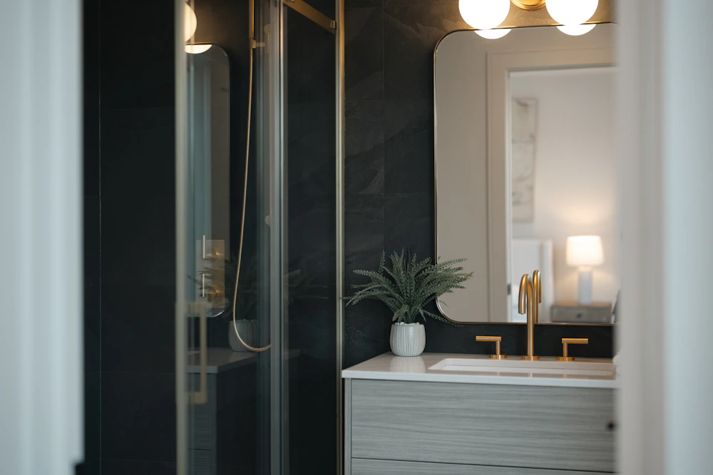 Bathroom vanity with gold fixtures